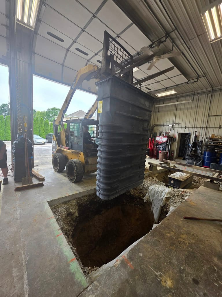 Inground lift pit excavation and installation